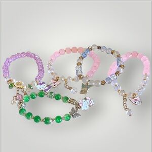 Hello Kitty 5 piece stretch bracelet set in pink green purple blue clear NWOT